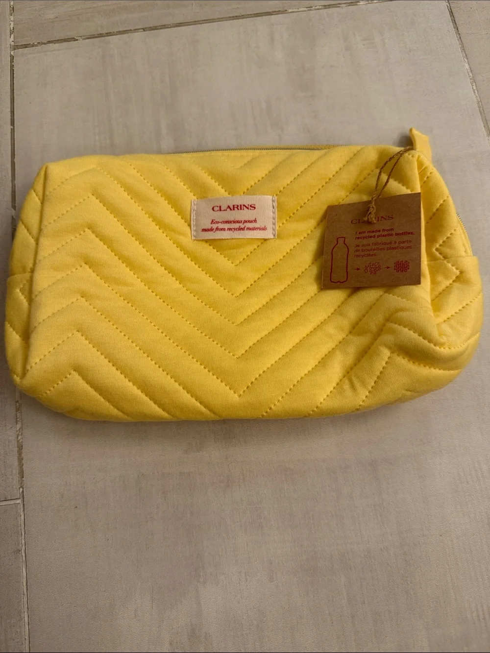Clarins Quilted Chevron Cosmetic Pouch in Bright Yellow
